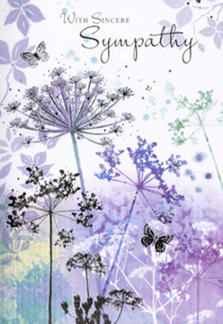 The front of this sympathy card reveals a tranquil, nature-inspired illustration that feels as peaceful as an early stroll past the trees near Northala Fields. Slender stems of wild, umbelliferous flowers rise from the base of the card, rendered in fine, almost calligraphic lines of soft violet, dusty lilac, and muted sage green. The flower heads float like lacework against a breezy wash of silvery blues and purples, the watercolour background gently diffused, as though seen through morning mist. Around the blossoms, translucent butterflies drift on almost imperceptible wings, appearing and disappearing in the pale light like quiet thoughts of someone dearly missed. Each detail is subtle, never loud-the petals are hint rather than proclamation, their edges blending into the background the way distant rooftops blend into the sky over Northolt in soft weather. The scene feels both still and quietly alive, with the suggestion of movement in the way the stems lean and arch toward one another. As local florists, we recognise the language of these shapes: they evoke remembrance, continuity, and the tender care that surrounds a family during a funeral or time of mourning. The palette is cool but comforting, a gentle embrace of lavender, blue-grey, and soft green that calms the eye and soothes the spirit. This is not a bold, showy card; instead, it offers an intimate, reflective space, like a pause by a quiet hedge off Church Road. It's a thoughtful way to send sympathy, allowing the artwork itself to speak of support and enduring love.