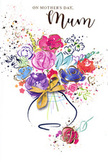 Illustrated Mother's Day card showing a joyful, hand-painted bouquet that appears to be blossoming straight out of the paper, much like a freshly arranged vase of flowers set on a windowsill in Northolt. The central bouquet is a harmonious mix of loose watercolour blooms in jewel-like purples, bright pinks, rich reds and soothing blues, subtly balanced by apricot and peachy tones and flashes of chartreuse foliage. Each flower is outlined or accented with fine strokes of shimmering gold that catch the eye and suggest both sunshine and sentiment, as if each petal carries a quiet message of love. Around the main cluster, speckles of colour and scattered heart shapes drift across the crisp white background, creating the feel of petals tossed in celebration or confetti swirling in a gentle breeze along a local Northolt pathway. The stems disappear into a softly contoured vase painted in translucent washes of blue and lilac, tied with an elegant golden bow that hints at the careful ribbon-tying seen on hand-tied bouquets prepared for delivery. The brushwork ranges from fluid washes that bleed into one another to sharper, more defined lines, mirroring the mix of spontaneity and intention behind every thoughtful Mother's Day gift. Overall, the image radiates warmth, joy and tenderness, like a visual embrace from child to mother, and would sit beautifully alongside real flowers delivered to homes throughout Northolt.